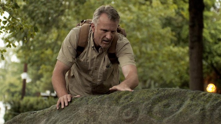Scott Wolter examining rock formations